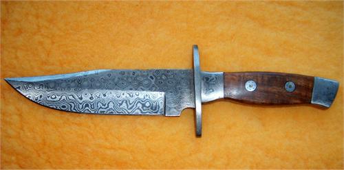 Antique Damascus Bowie Knife Antique Damascus Bowie knife with wood handle in excellent condition and craftsmenship