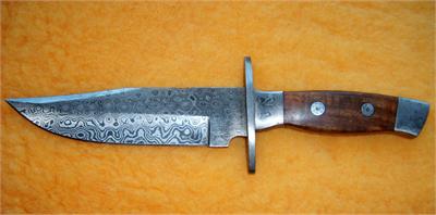 Antique Damascus Bowie knife with wood handle in excellent condition and craftsmenship